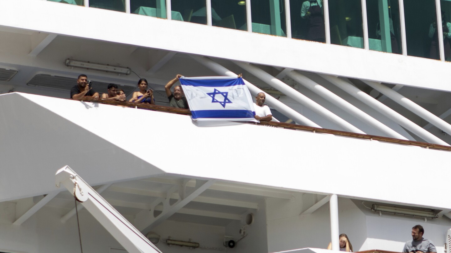 Anti-war demonstrators protest the arrival of an Israeli cruise ship on the Greek island of Crete