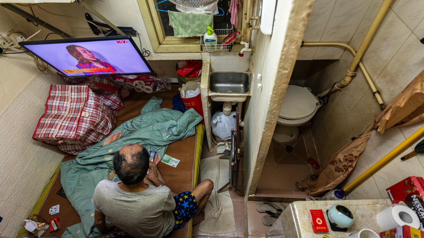 Hong Kong lawmakers pass bill to ban substandard tiny apartments