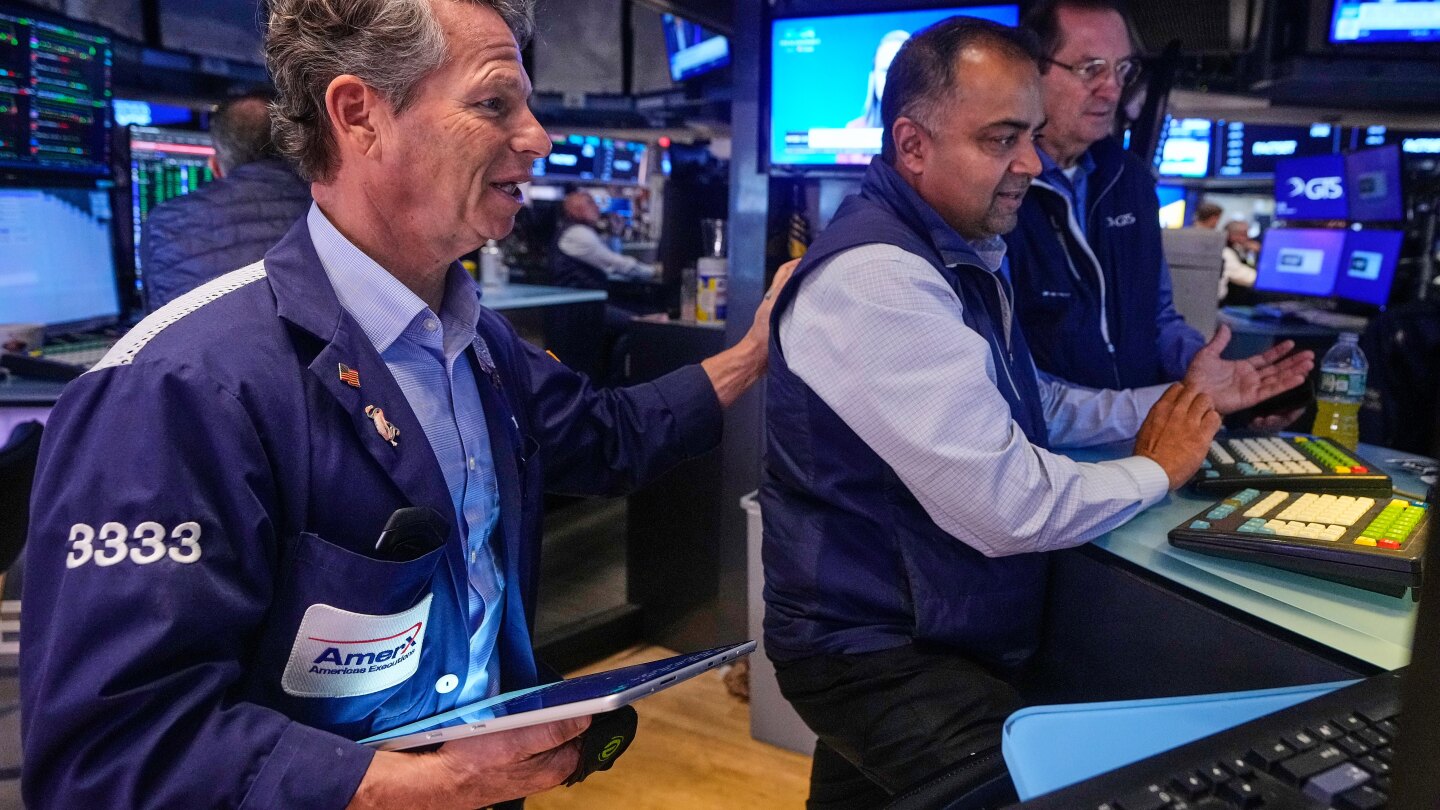 Apple’s rally pulls Wall Street to the cusp of its record