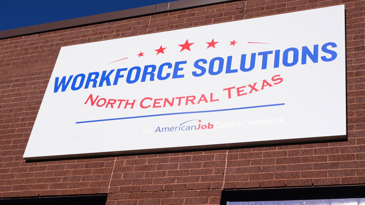 Fewer Americans sought unemployment benefits last week as layoffs remain low