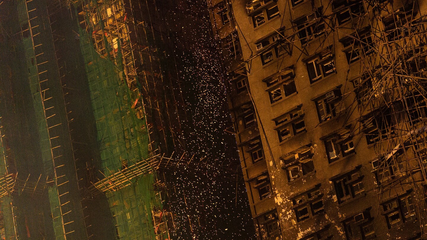 Fire in Hong Kong draws focus to bamboo scaffolding, though cause remains unclear