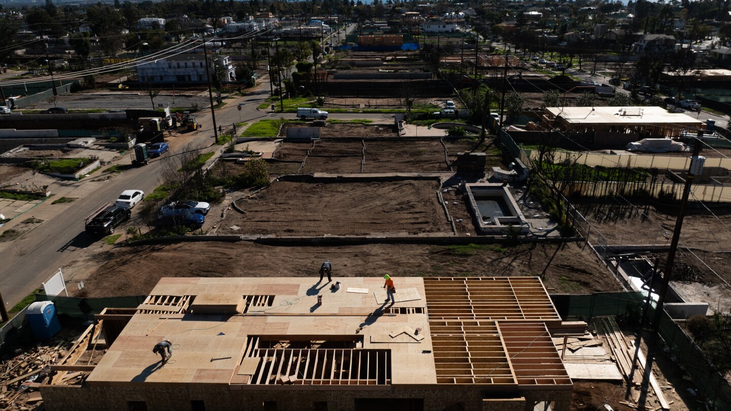 Most people remain displaced a year after LA-area wildfires destroyed neighborhoods